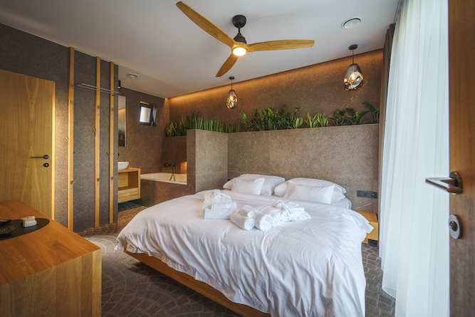 Luxury bath linens such as on this bed are important for hosting guests